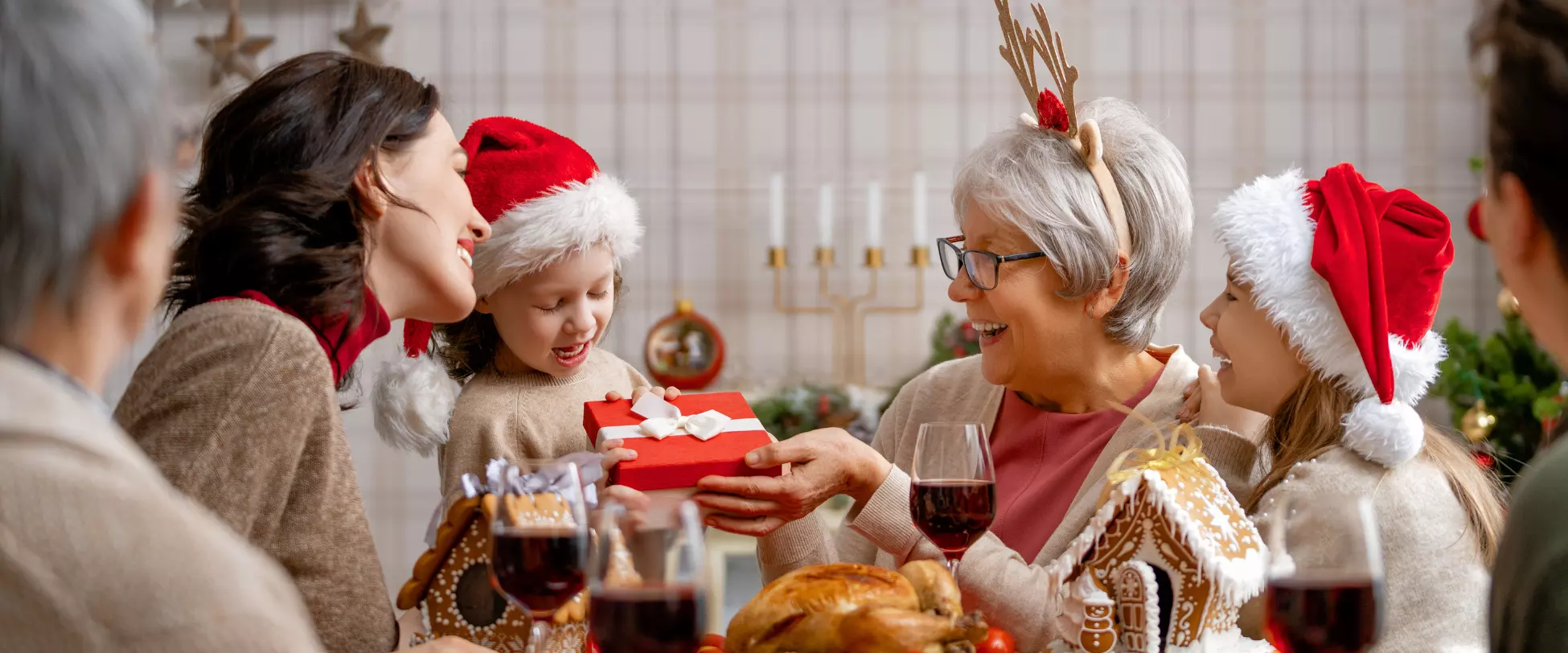 A family celebrate Christmas.